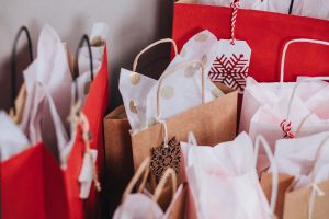 waste: brown and red bags filled with festive tissue paper