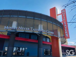 movie tavern building with sun in the background