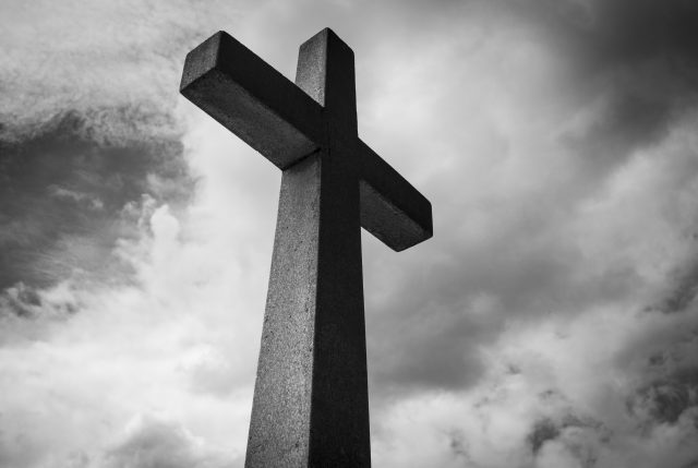 ash wednesday: black and gray picture of a cross and the sky