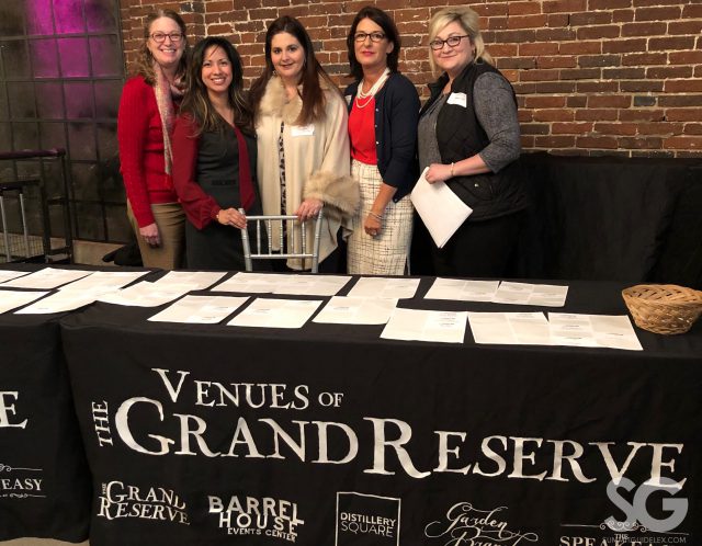 Women Leading Kentucky: group of women standing behind a table smiling at the camera