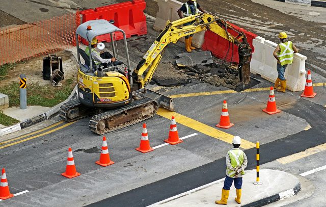 Work Zone: construction crew working on a road