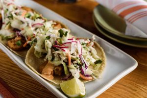 The Summit: tacos on a white rectangular plate