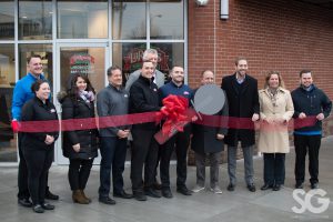 LaRosa's: group of people doing a ribbon cutting