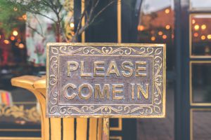 Christmas: a metal sign that says please come in